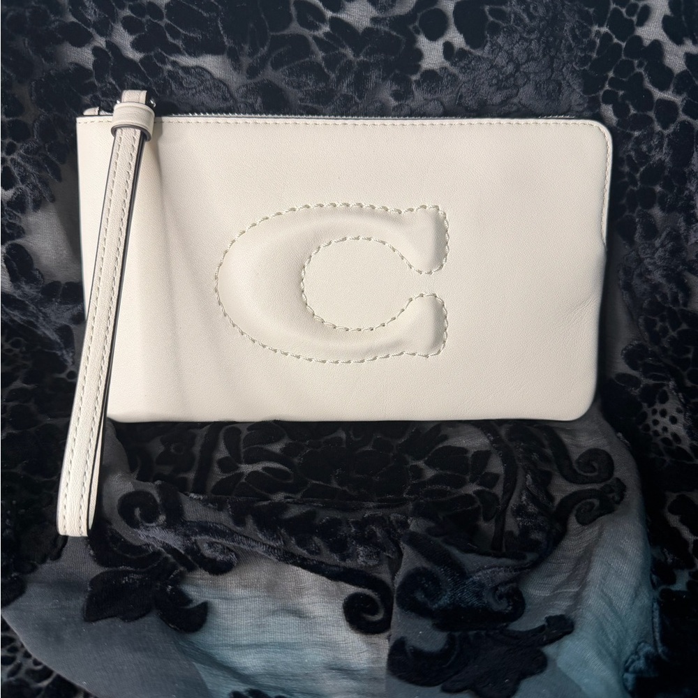 Coach Ivory Wristlet with Embossed Logo